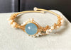 Exquisite Handcrafted 14K Gold Bracelet with Sapphire & Pearl